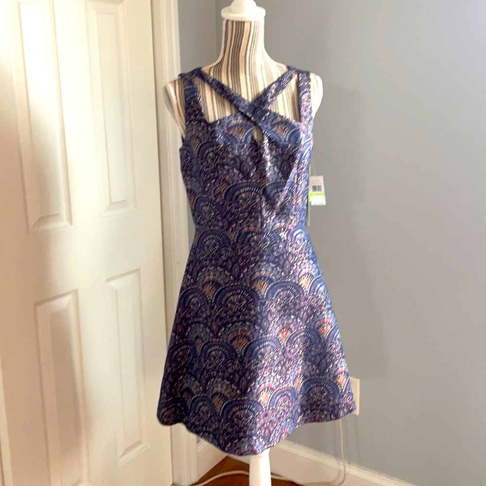 Cece dress with detailed neckline.